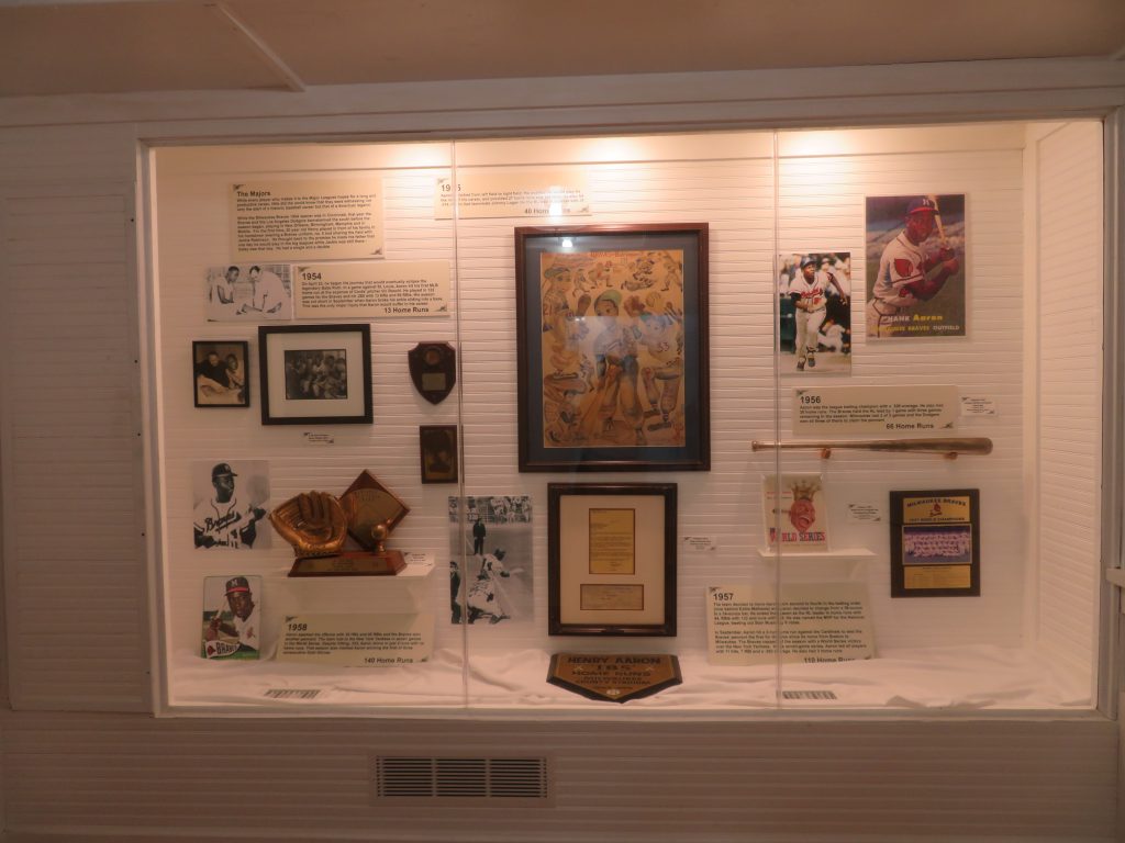 Exhibit showing memorabilia from Hank Aaron's tenure with the Milwaukee Braves.