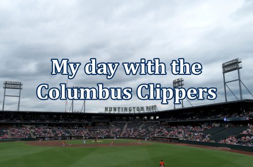 Overview of a baseball stadium with letters above the rooftop that spell out "Huntington Park" with text overlaid that says "My day with the Columbus Clippers."