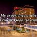 Nighttime view of tall hotel with text saying "My experience at the Crowne Plaza Dayton" overlaying the image.