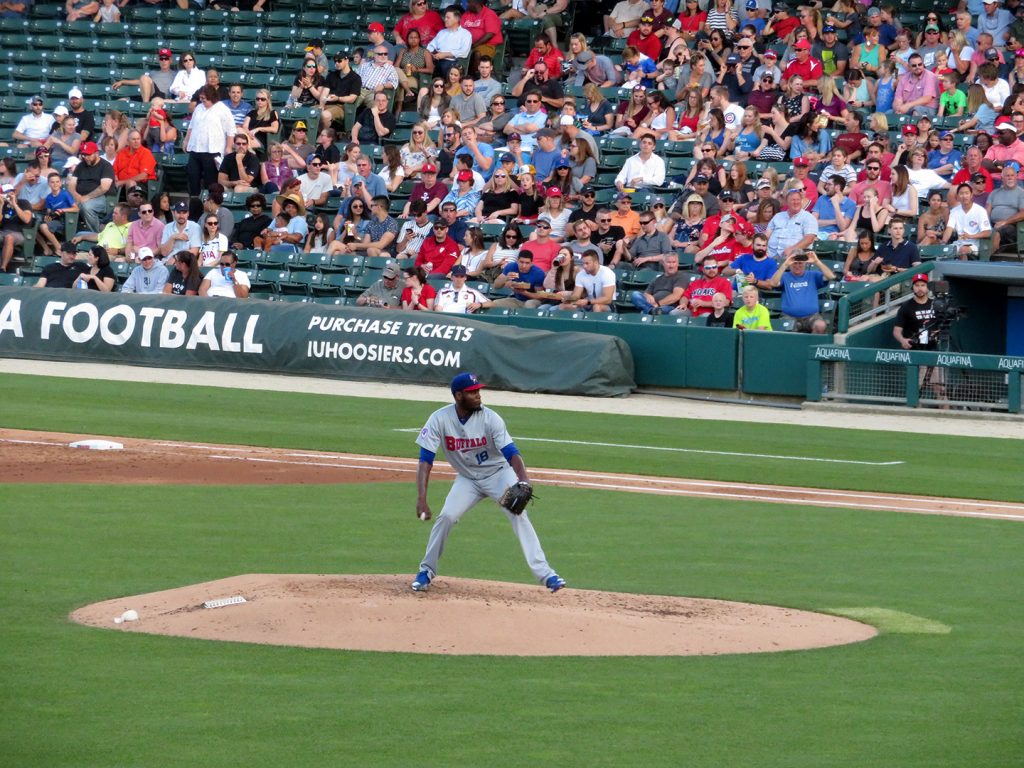 Buffalo Bisons right-handed pitcher David Paulino rearing back to deliver a pitch.