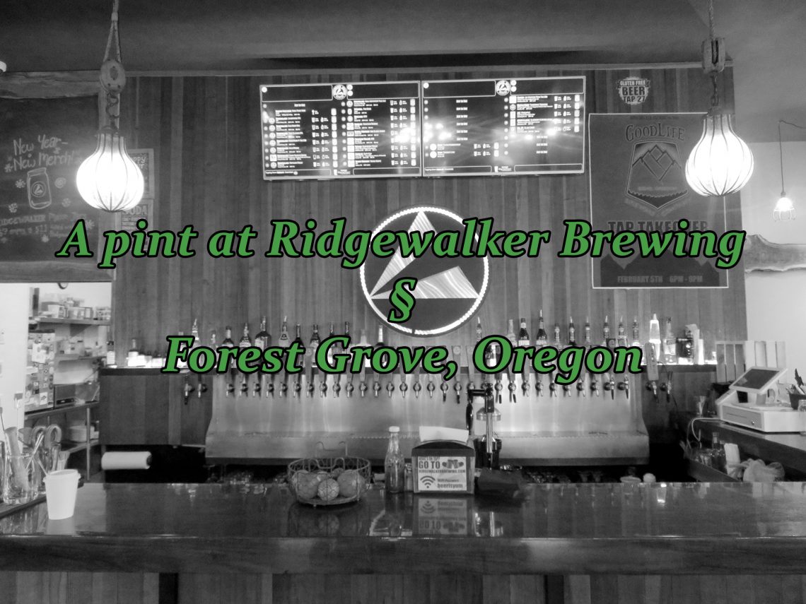 Black-and-white photo showing a bar with a digital drink menu in the middle of the wall. Text overlays the image saying "A pint at Ridgewalker Brewing § Forest Grove, Oregon."